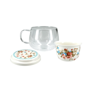 Kubek szklany z ceramicznym zaparzaczem i przykrywką.